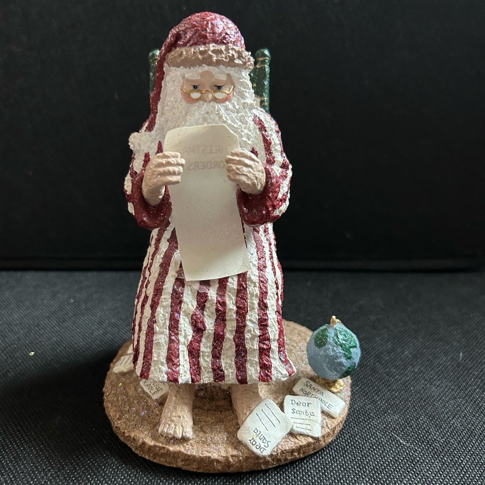 Festive Santa Claus Figurine with Globe